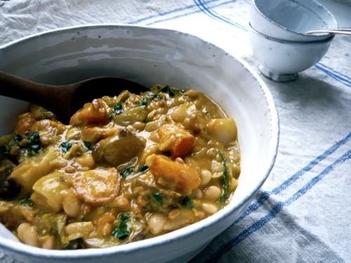Fall vegetable cannellini bean stew with spelt berries and kale